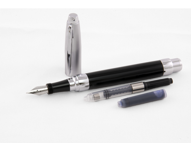 Presimo Fountain Pen in Tuxedo Black disassembled with chrome cap, ink converter, cartridge, and nib shown on white surface